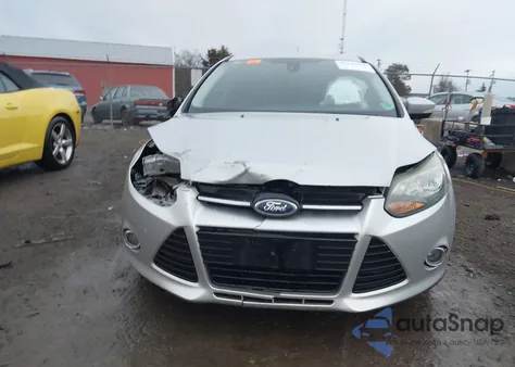 2012 Ford Focus Titanium from USA, damaged, VIN 1FAHP3N25CL194088